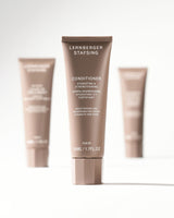 Feuchtigkeitsspendende und kräftigende Spülung in Reisegröße