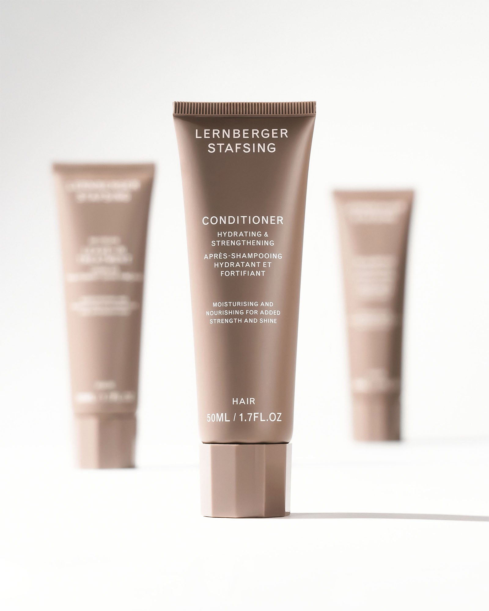 Feuchtigkeitsspendende und kräftigende Spülung in Reisegröße